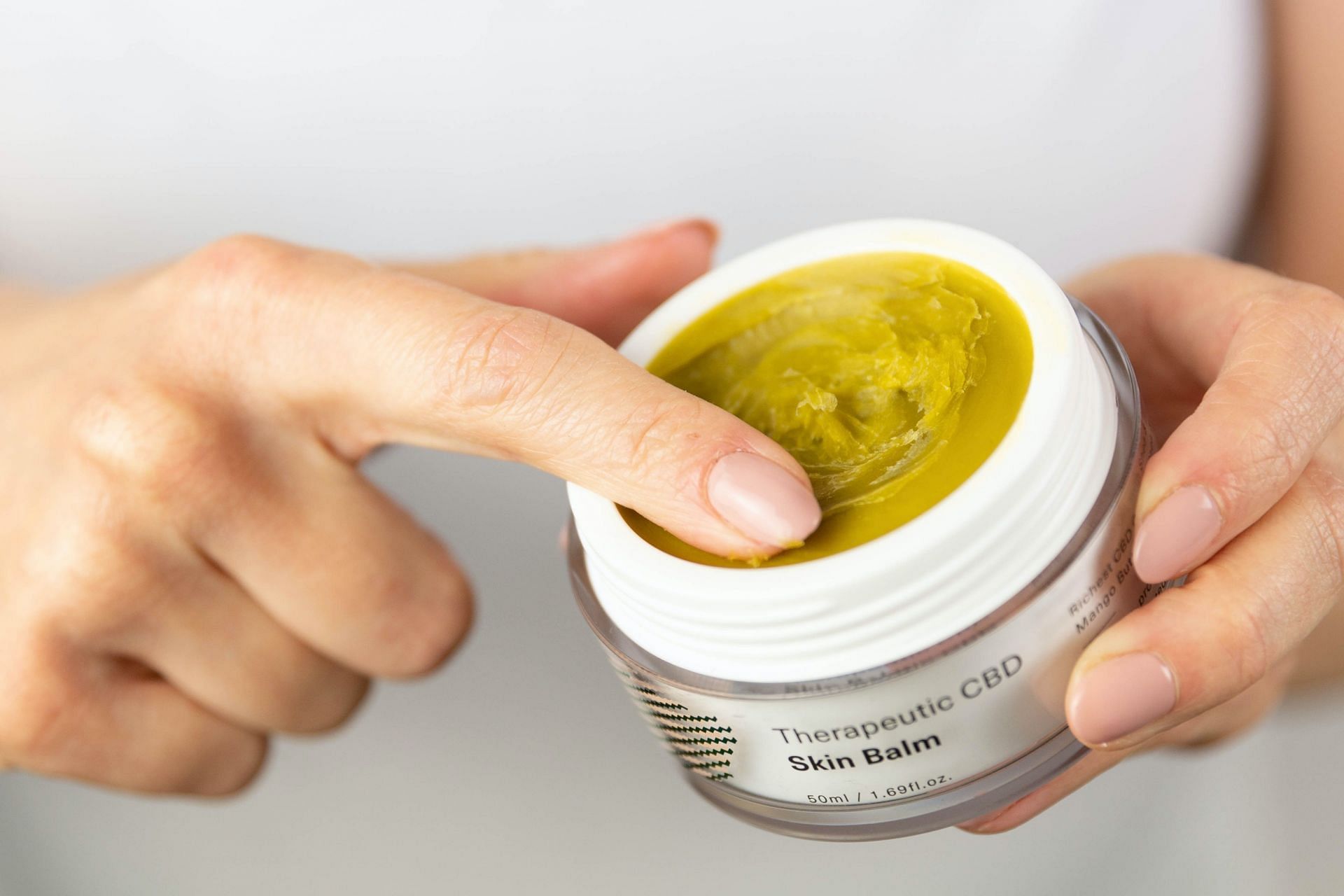 using an under eyecream. (Image via unsplash / Hemptouch CBD)